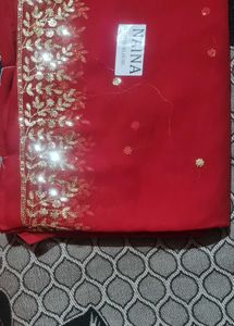 Elegant Red Saree with Gold Embroidery