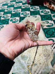 RING WITH HAND DESIGN