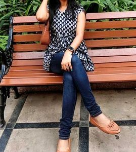 Flared Black Top With Teardrop Detail