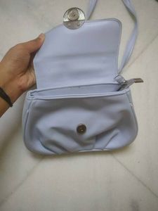 A Cute , Stylish Light Pastle Blue Sling Bag