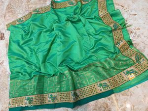 Elegant Green Silk Saree with Elephant Border