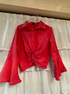 Sfront knot cropped pink with bell sleeves shirt