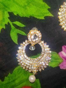 Earings And Teeka.