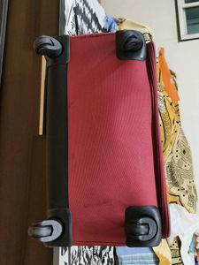 VIP Maroon Soft Textured With Wheels Trolly Bag