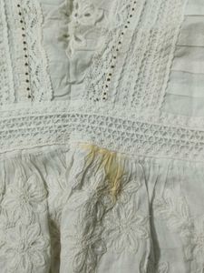 White Embroidered Peplum Top