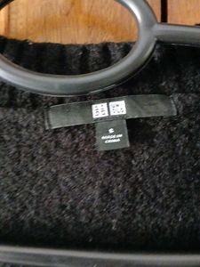 Black Knit Cardigan And Red Sweater