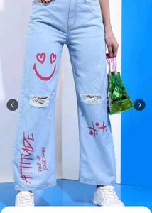 Ripped Jeans with Graffiti