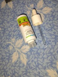 Empty Mamaearth Face Serum bottle