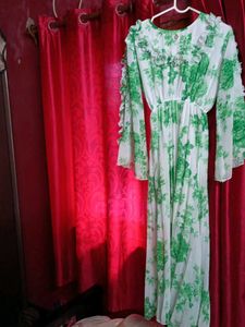 Green floral Print georgette Gown.