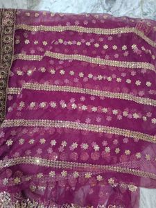 Heavy Work Purple Net Saree With Shiny Petticoat.