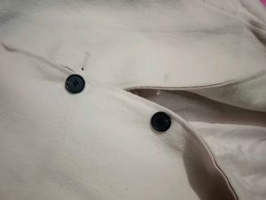 beige colour overcoat