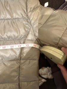 Light gold puffer jacket from Mango