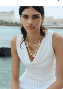 White Sleeveless Top