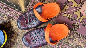 Orange &amp; Black Flip Flops in 10