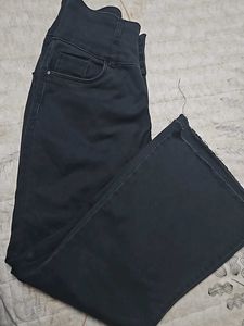 Charcoal coloured bootcut denim jean