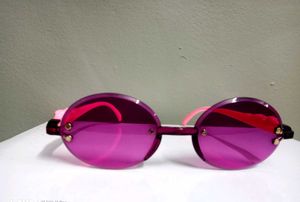 Pink Frameless Sunglasses