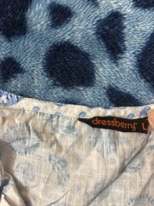 white top with blue botanical prints