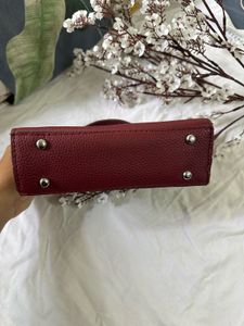 Maroon handbag