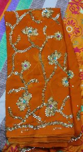 embroidered heavy orange saree