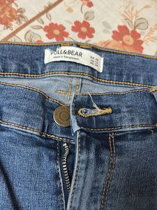 Ripped Knee Denim Jeans