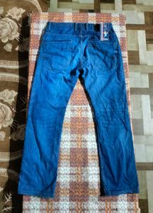 Distressed Blue Denim Jeans