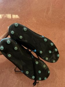 PUMA VITORIA FG/AG Black Luminous Blue Shoes