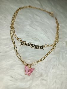 2 Layered golden pendant with butterfly charm