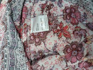 Floral Print Lace-Up Bell Sleeve Top