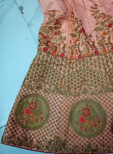 Peach and pink Embroidered bridal Lehenga Choli