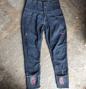 High-Waisted Embroidered Jeans