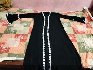 Elegant Black Abaya with Floral Details