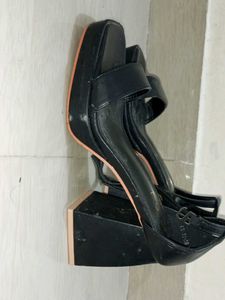 Strappy front open 3 inch black heels.