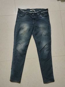 Distressed Dark Wash Denim Jeans