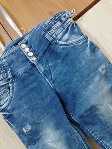 Distressed High-Waisted Denim Jeans