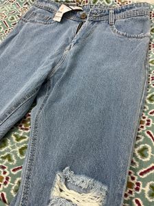 Women Ripped Knee Denim Jeans