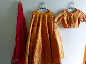 Yellow Bridal Partywear Lehenga .With Pink Dupatta