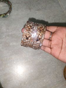 2 Sets Of Two Shiny Bangles
