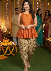modern pulm top and dhoti along with shrug