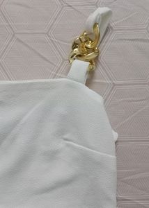 White crop top with golden strap
