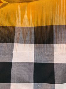 golden yellow and checkered border pure silk saree