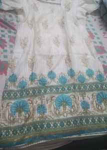 Elegant Embroidered Kurta in firozi colour