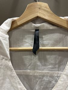 A smart classic white shirt with twist