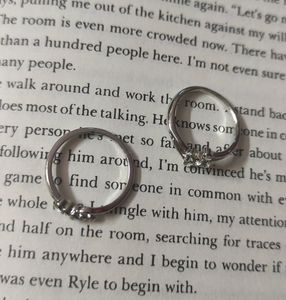 Silver diamond rings.