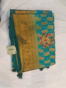 Elegant Teal & Gold Saree
