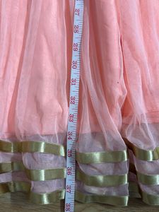 Peach Color Gown In Net For Girls
