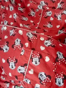 a red night suit gives cozy vibe wth detailings of