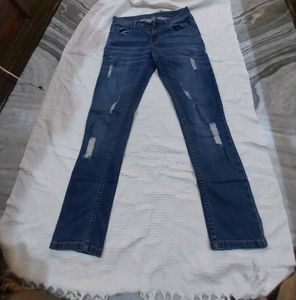 Distressed Blue Denim Jeans
