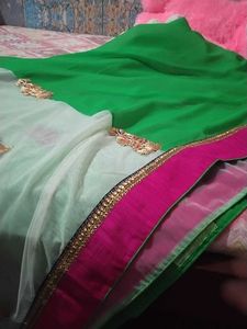 Saree half green and white combination.