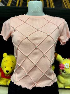 Pearl Lattice Ruffle Knit Top