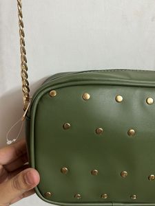 Party Wear Green Sling With Metal Chain Detail